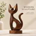AVOLTT solid wood cat sculpture with pointed ears, an oval body opening, and a curved tail on a round base